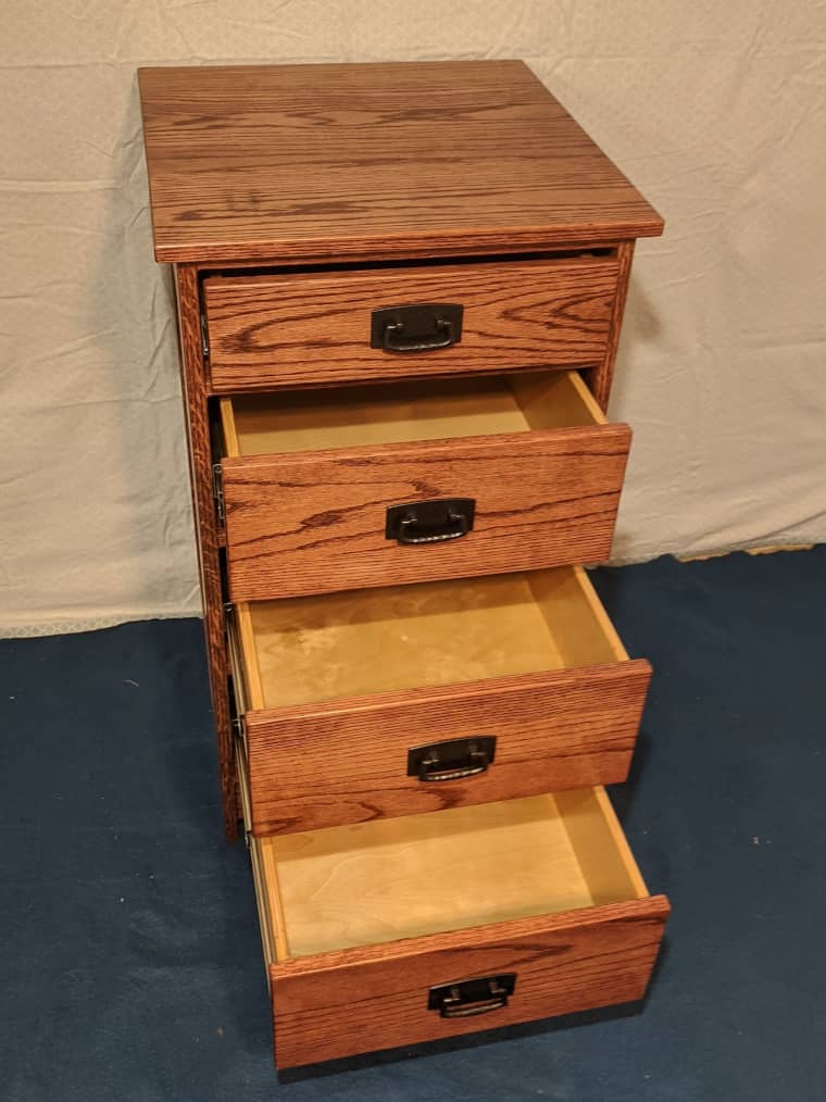 The nightstand with drawers open